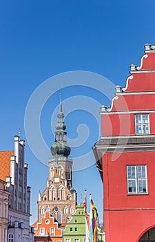 Colorful houses and tower of the St. Nikolai dom in Greifswald