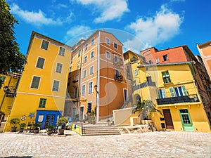 Colorful houses under blue sky in Menton, France