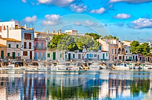 Colorful houses at waterfront of Porto Colom harbor on Majorca island