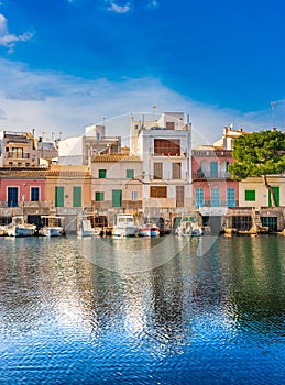 Colorful houses at waterfront of Porto Colom on Majorca, Spain