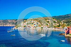 Colorful houses with yachts in Assos village on Kefalonia Island in Greece