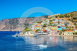 Colorful houses with yachts in Assos village on Kefalonia Island in Greece