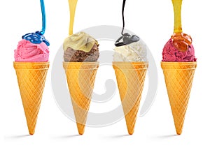 Colorful ice cream watered with different sauces photo