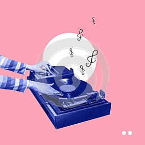 Colorful image of female hands spinning retro vinyl record player like a dj isolated over pink background. Contemporary