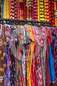 Colorful Indian costumes selling in front of the boutique shop in Brickfields Little India