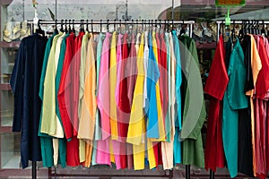 Colorful Indian costumes selling in front of the boutique shop in Brickfields Little India