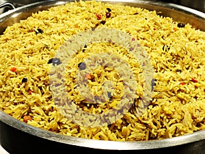 A colorful Indian rice dish made from basmati rices spices and fresh vegetables