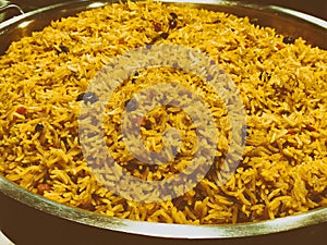 A colorful Indian rice dish made from basmati rices spices and fresh vegetables