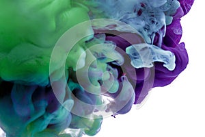 Colorful ink. purple blue drop swirling under water. Cloud of ink in water. abstract background