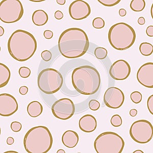 Colorful irregular polka dots circles vector seamless pattern. Trendy seamless pattern with golden yellow and pink circles on