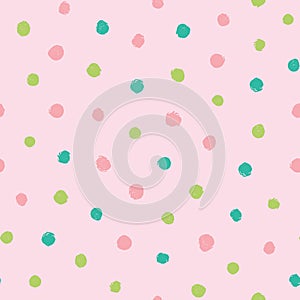 Colorful irregular polka dots vector seamless pattern. Trendy seamless pattern. Pink, green circles on pink background