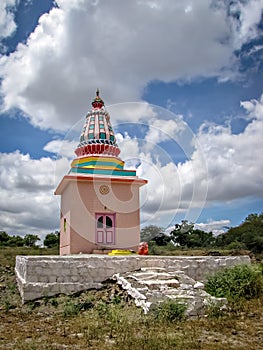 Colorful isolated image of a temple in the outskirts of village.
