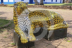 Colorful Jaguar figure as a bench in a park as a tourist attraction, Chapada dos Guimaraes, Mato Grosso, Brazil