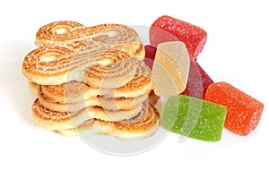 Colorful jelly candies and cookies isolated