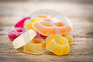 Colorful Jelly Candy on rustic wooden background