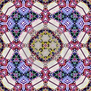 Colorful kaleidoscop pattern for rug and batik carpet in grenadine, pink, wine, blue and violet