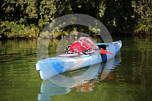 Colorful kayak on the tropical river