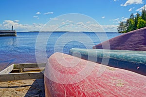 Colorful Kayaks on Lake Shore at Summer