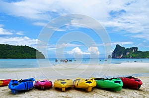 Colorful kayaks on Loh Dalum beach at Phi Phi Don island