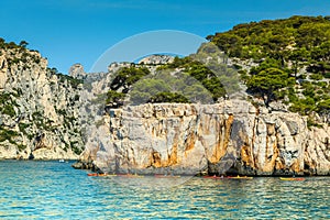 Colorful kayaks in the rocky bay, Calanques national park, France