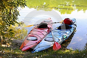 Colorful kayaks on the tropical beach.