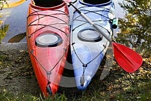 Colorful kayaks on the tropical beach.