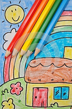 Colorful kids' drawing: home, rainbow, sun, sky