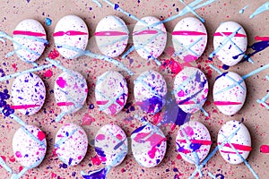 Colorful kids Easter eggs splattered in paint