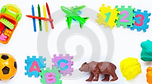 Colorful kids toys on white background