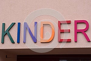 A colorful Kinder children sign