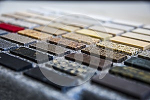 Colorful kitchen counter tops of granite, marble and quartz. Stone kitchen worktop color samples.