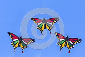 Colorful Kite Flying in Blue Sky