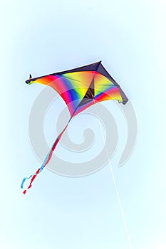 Colorful kite flying on sky