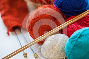 Colorful knitting thread balls on a table