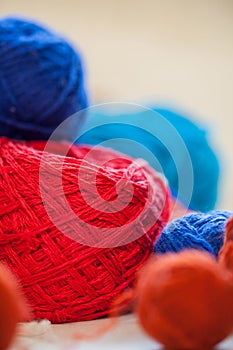Colorful knitting thread balls on a table