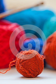 Colorful knitting thread balls on a table