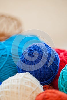 Colorful knitting thread balls on a table
