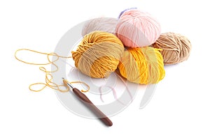 Colorful knitting yarn with crotchet on white background