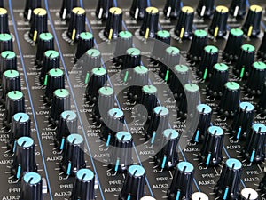 Colorful Knobs on a Sound Mixing Board Up Close