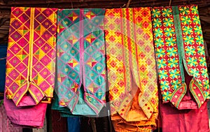 Colorful kurta mens shirt at a market, India