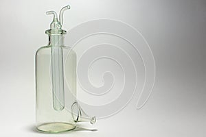 Colorful lab bottle on monochrome background. chromatographic