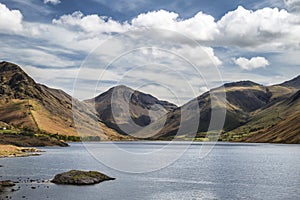 Colorful Lake District mountains landscape reflected in still la