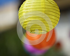 Colorful lampions hanging in line for lighting