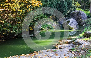 Colorful landscape with stones and stream, Sofievka park, Uman