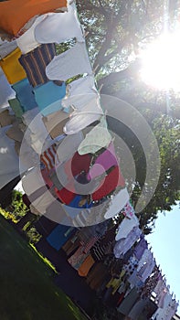 Colorful Laundry Hanging on a Clothes Line to Dry in the Sun