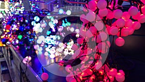 Colorful LED Christmas tree lights on the shelf of a store