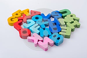 Colorful letter blocks shape heart