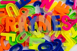 Colorful Letter Magnets Spell Out Rhymes photo