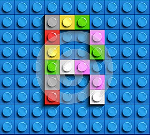 Colorful letter R from building lego bricks on blue lego background. Lego letter M