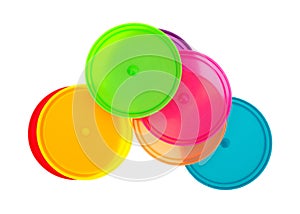 Colorful lids on a white background.